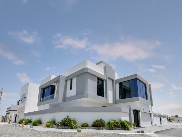 A modern Villa for Sale in Janabiyah, surrounded by desert.