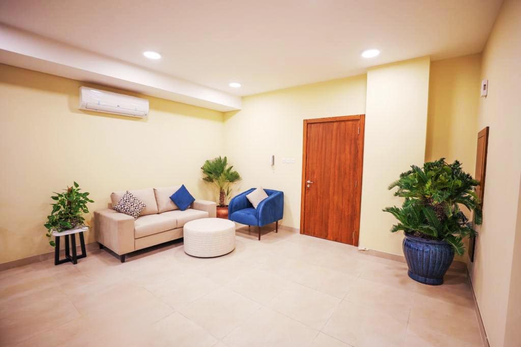 An amazing living room with a couch, chairs, and a fan in 2BR Apartments for Sale in Daih.