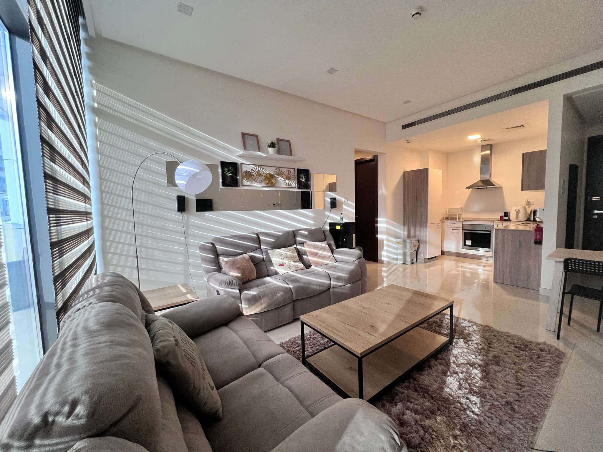 A luxury living room with a couch and a table.