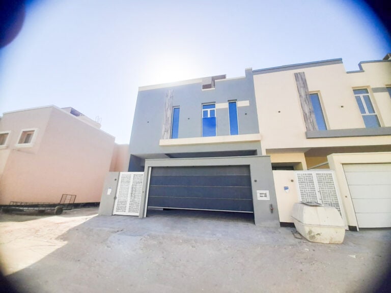A Sitra villa with a garage for sale.