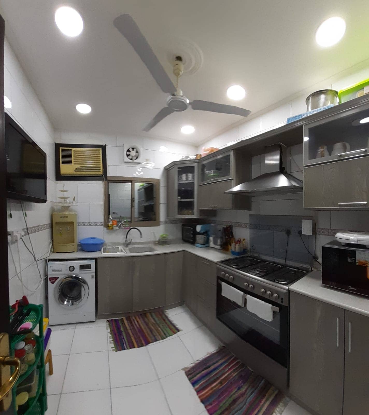 A Samaheej apartment for sale with a sink and appliances.