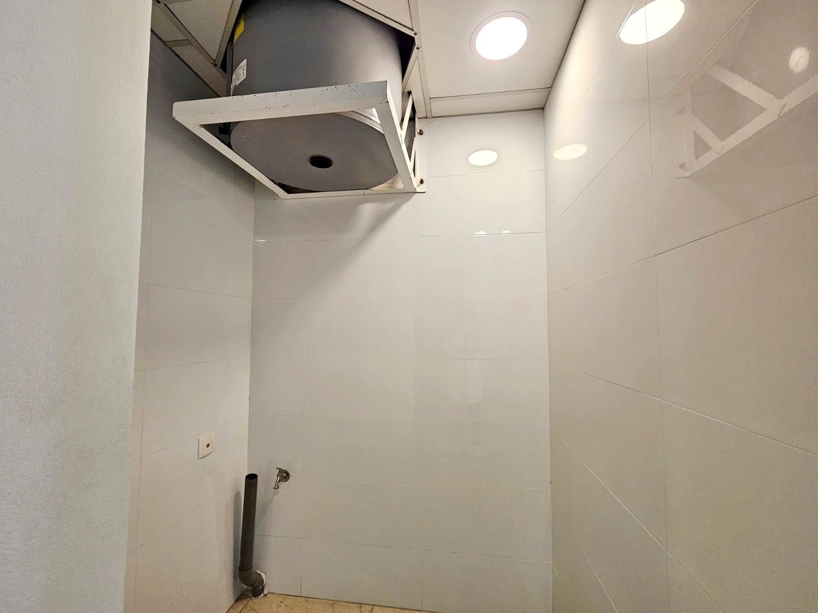 A bathroom with an auto shower.