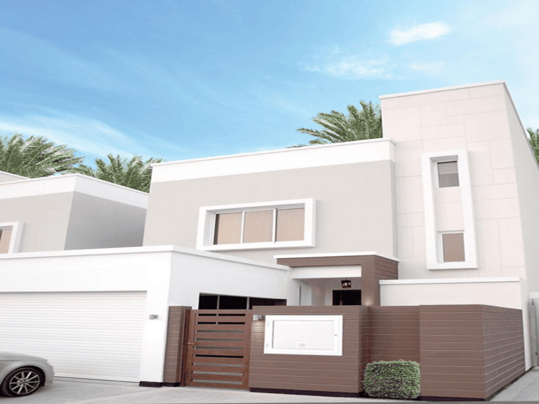 Modern two-story villa with a white and brown facade, large windows, and a garage, under a clear blue sky in Diyar Al Muharraq.