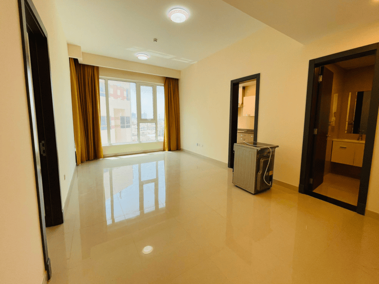 Empty luxury apartment living room with glossy tiled floors, large window with curtains, and open doors leading to other rooms.