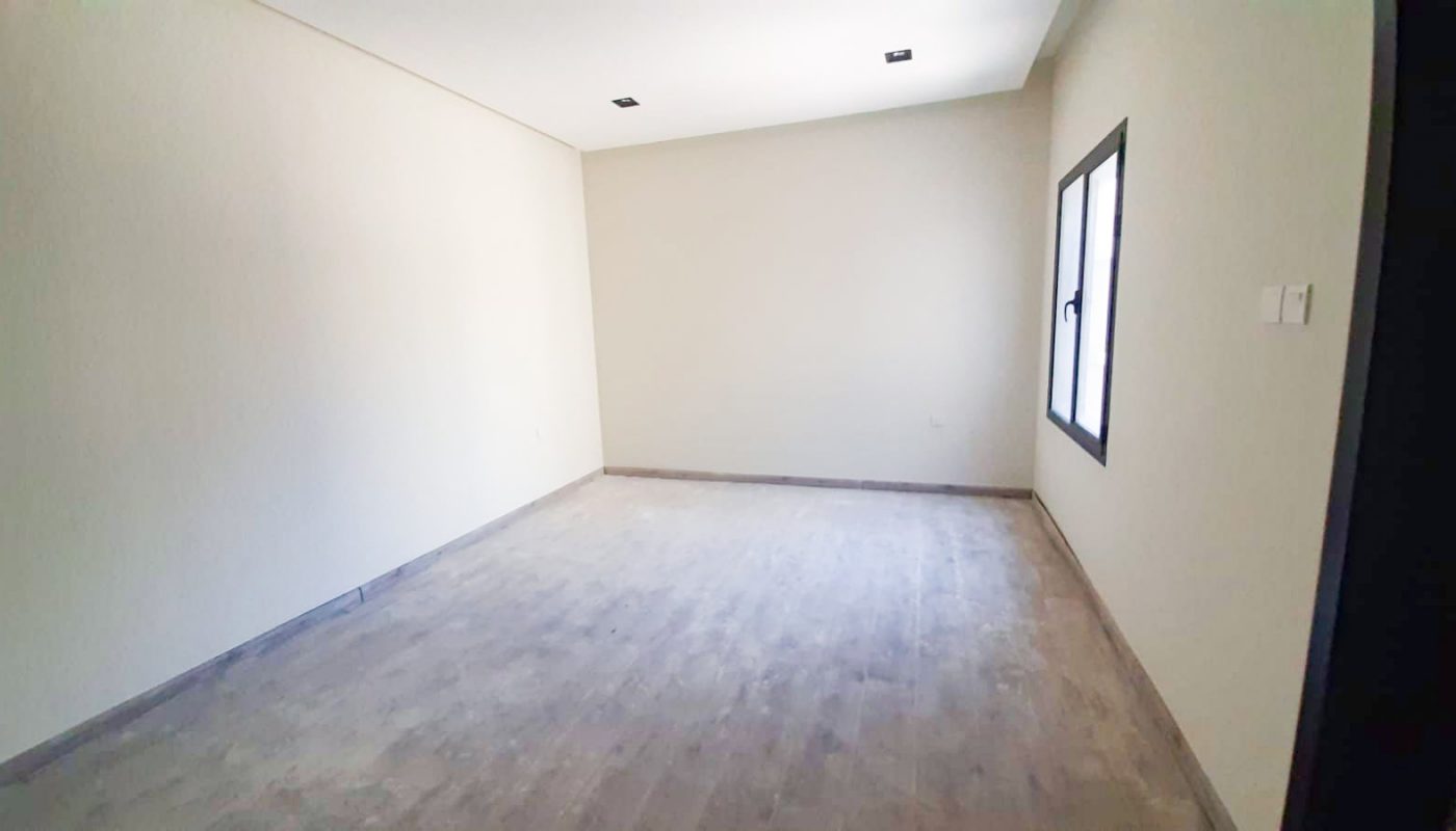 A luxurious villa with wood floors, a window, and 3 bedrooms for sale in Durrat Al Muharraq.