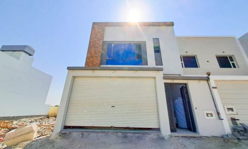 4BR Villa for Sale in Malkiyah, with a mesmerizing garage and sunlit ambiance.