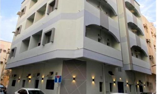 The residential building in Al Hoora where the apartment is available for sale.