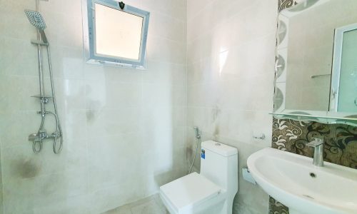 Luxury apartment with a toilet, sink and shower for sale in Riffa.