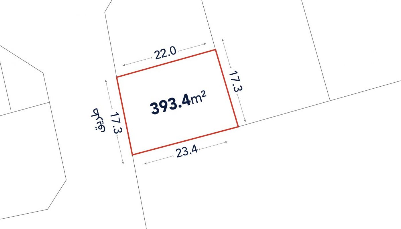A rectangular land plot outlined in red, labeled 393.4 m², with side lengths 22.0 m, 17.3 m, 23.4 m, and 17.3 m, and adjacent streets labeled in Arabic.