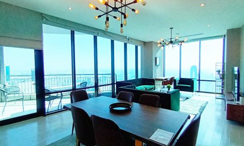 A luxurious apartment with a view of the city's Seef district, available for rent.