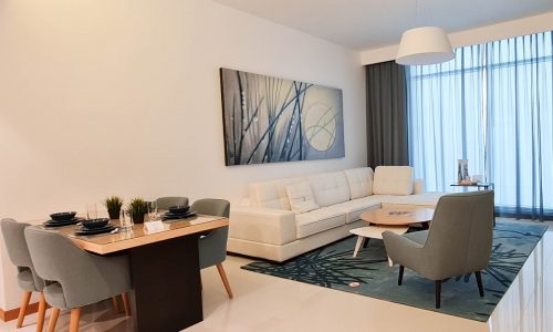 Fully furnished modern apartment for rent with living and dining area.