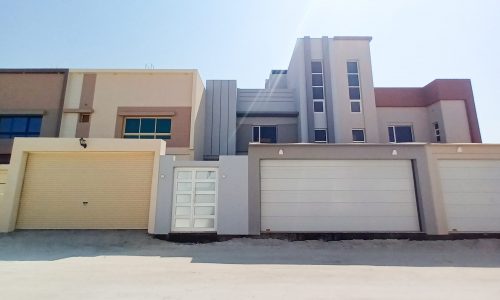 A perfectly designed villa with two garages in front for sale in Malkiyah.