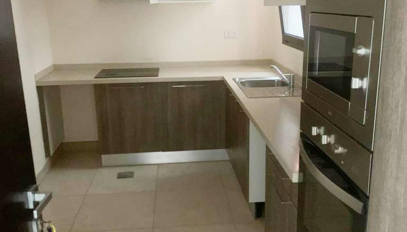 Keywords Used: kitchen, stove, microwave
Description: A kitchen equipped with a stove and microwave.