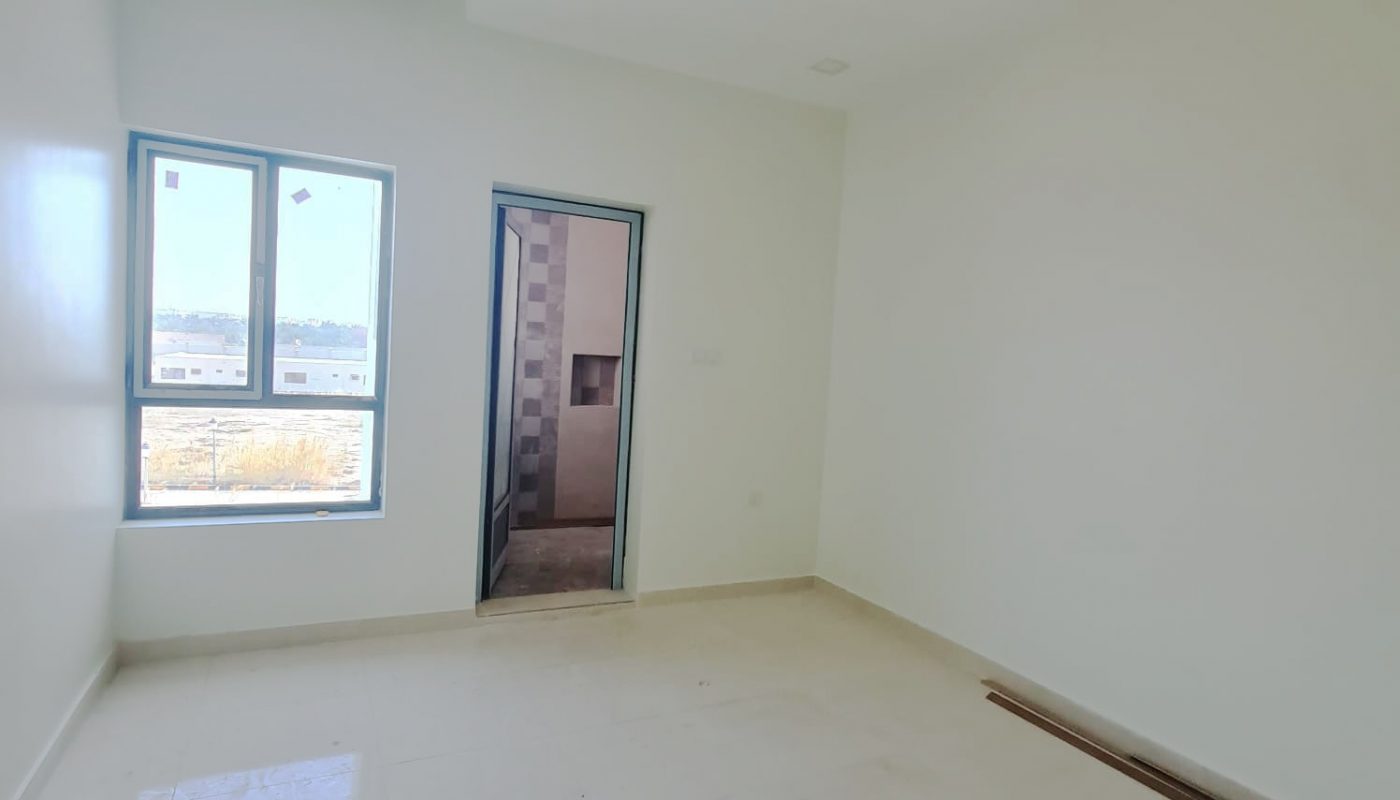 New villa with white walls and a window for sale in Malkiyah