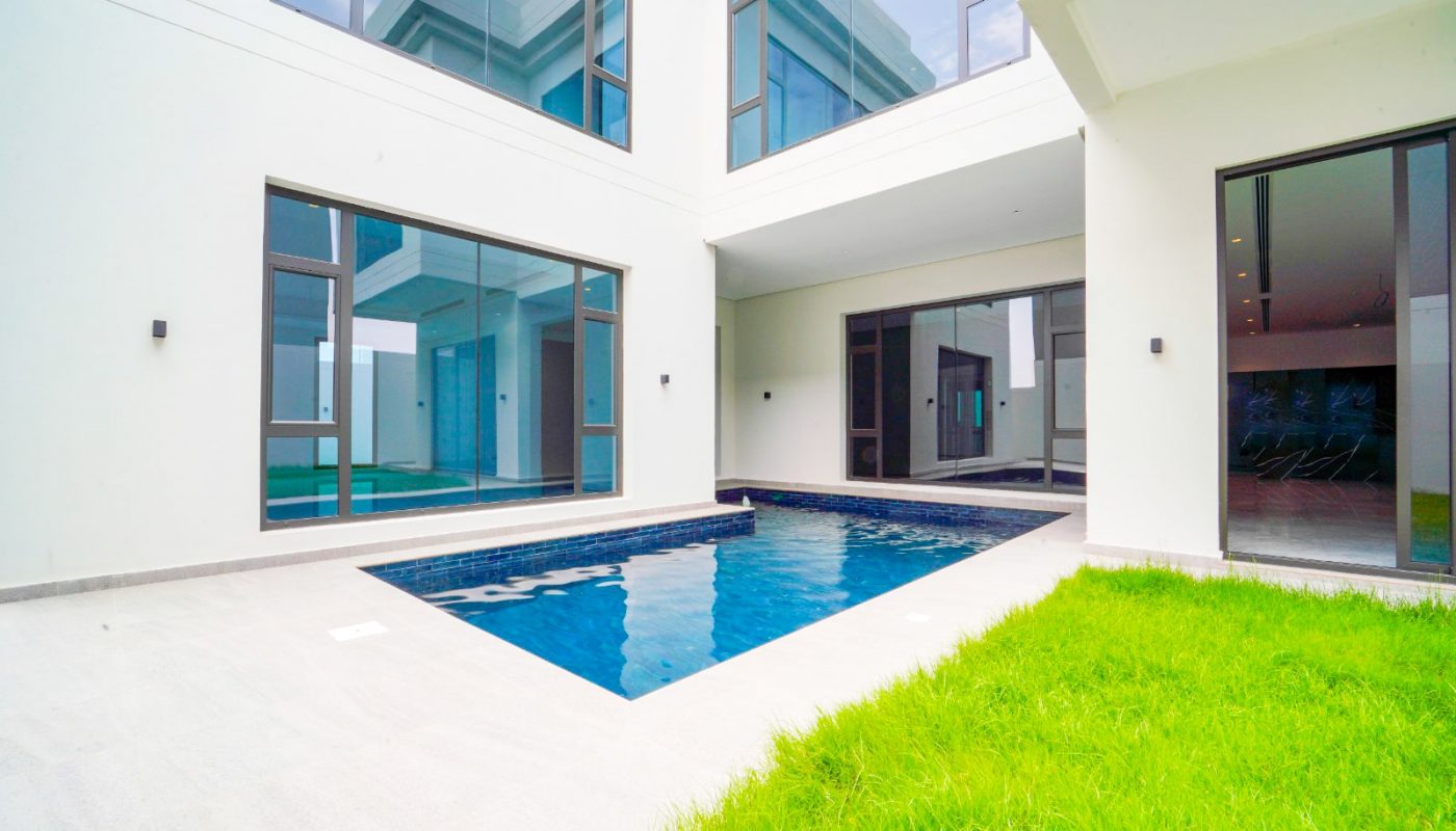 A luxurious modern 5BR Villa in Saar with a swimming pool in the backyard.