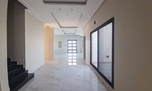 Stunning glass door leads to a 3BR villa in the Damistan area.