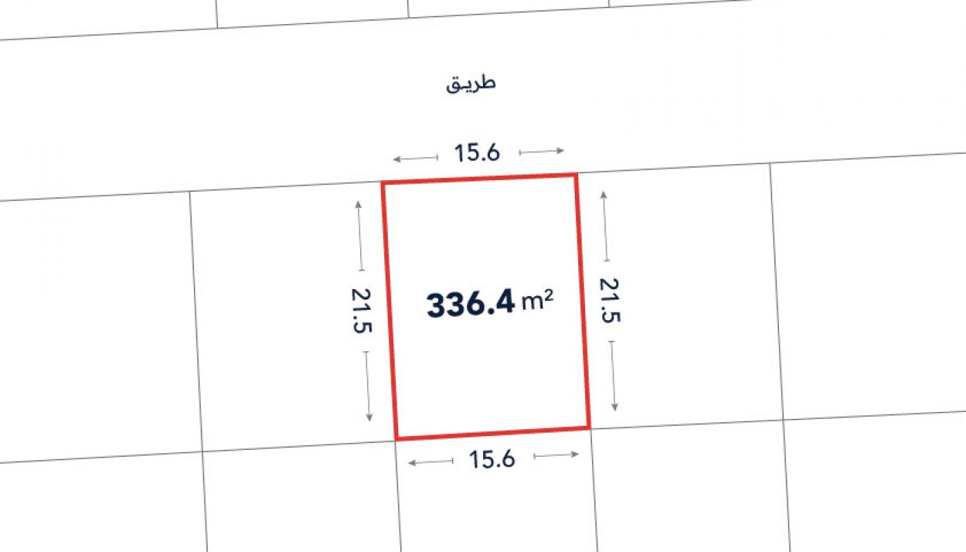 A rectangular plot outlined in red, labeled 336.4 m², with dimensions 15.6 meters by 21.5 meters, adjacent to a road labeled "طريق" (Arabic for "road").