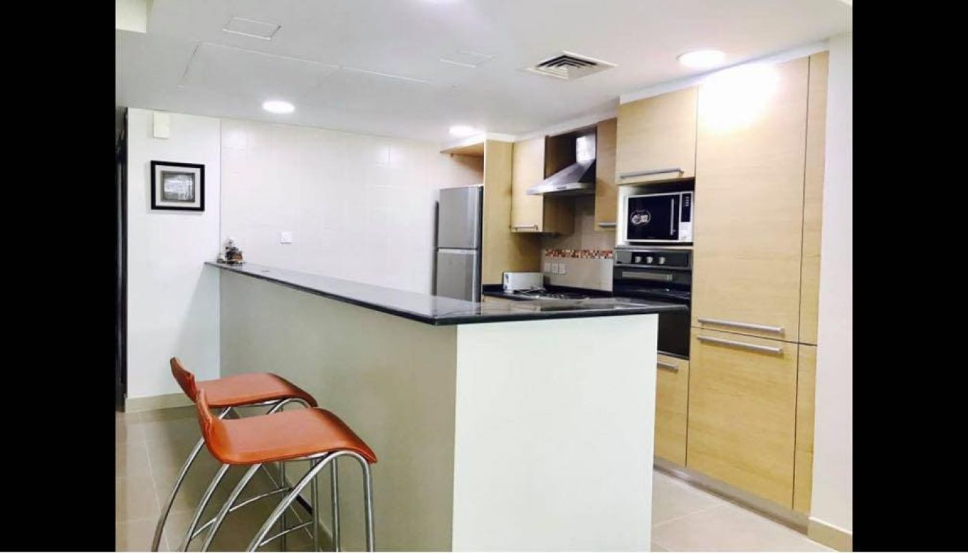 Furnished Apartment with small kitchen and refrigerator available for rent in Amwaj Islands.