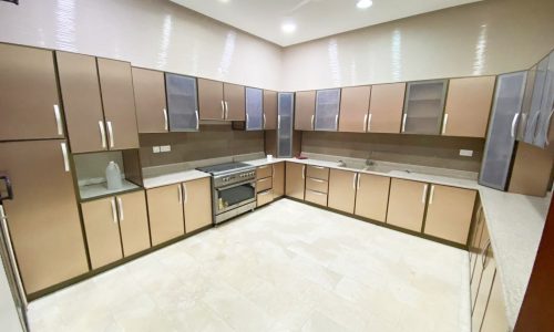 A luxurious kitchen with stainless steel appliances.