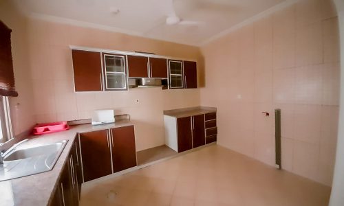 A bright flat for rent in Jeblat Habshi with a kitchen equipped with a sink and a ceiling fan.