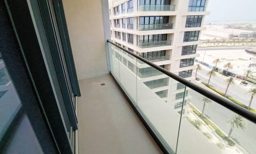 Stunning apartment with glass balcony overlooking the city for sale.