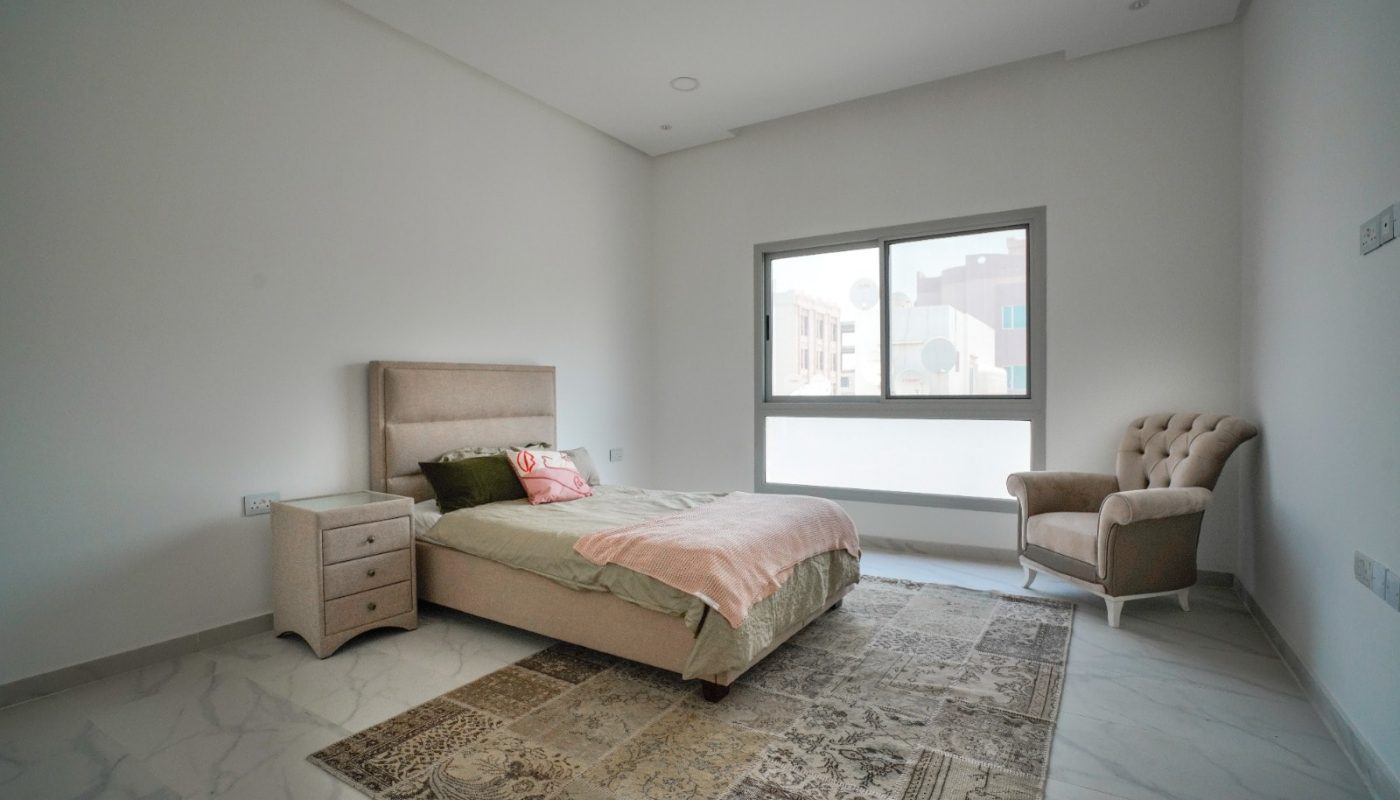 Spacious bedroom with a bed and a bedside table in a great location.