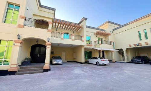 A house with two cars parked in front of it, perfect for those in need of SEO keywords or an Auto Draft.