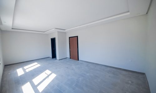 Stunning villa in Durrat Al Muharraq area with white walls.