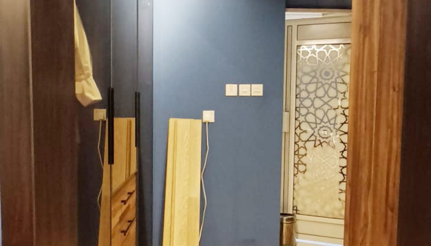 Amazing 4BR Villa with blue walls and wooden floors for sale in Al Gufool.