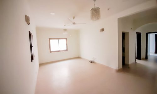 2BR Bright Flat for Rent in Jeblat Habshi with white walls and ceiling fan.