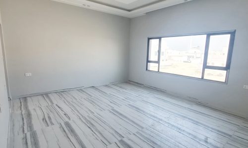 A brand new 3BR villa for sale with a window and a white floor.