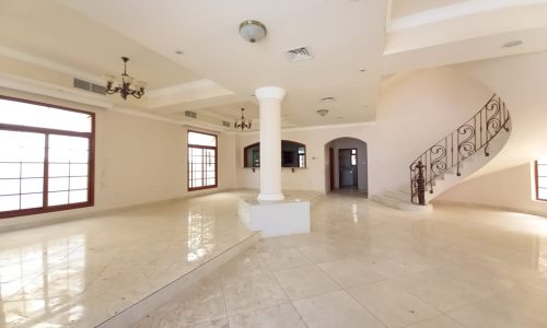 A large room with stairs and a staircase.