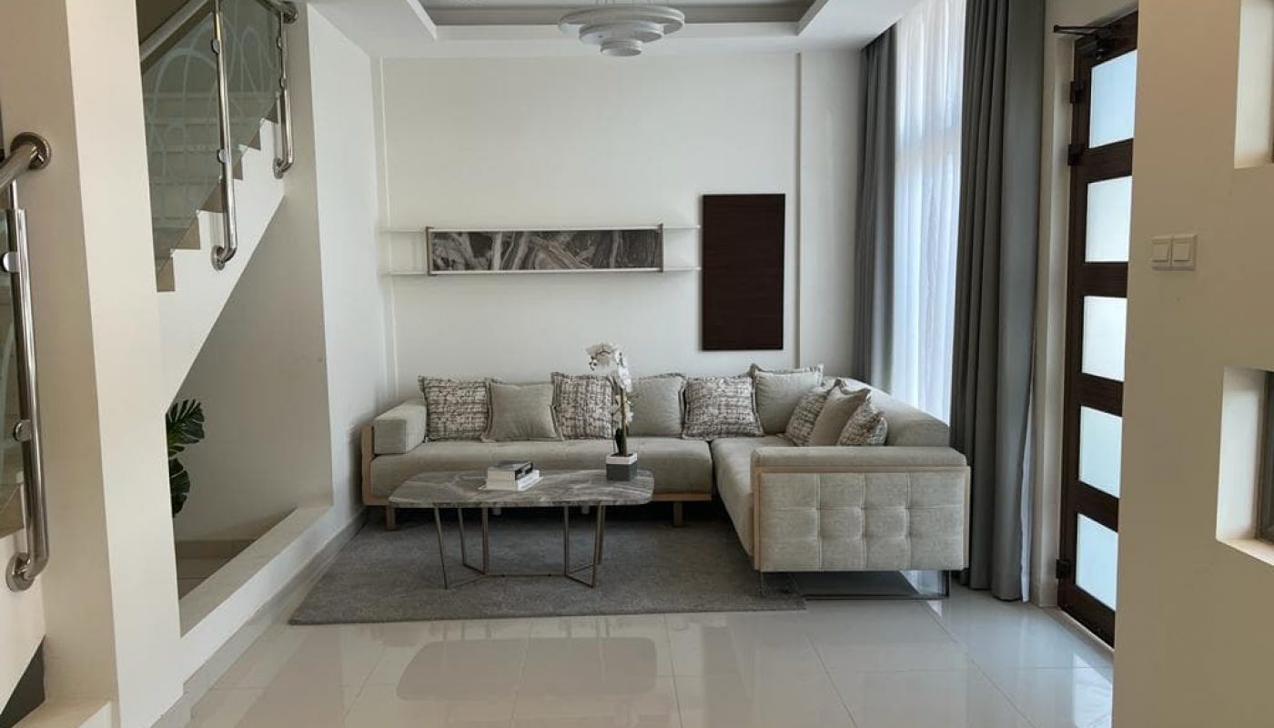 New Luxury 4BR Villas for Sale in Hidd featuring a living room with a balcony.