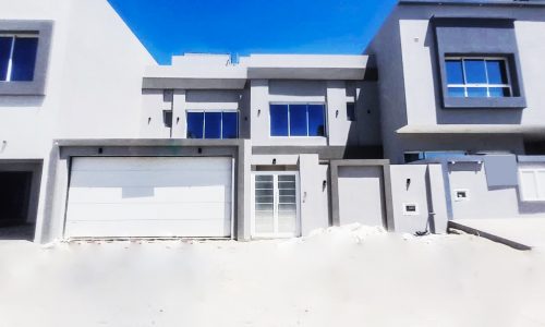 A luxury villa with a garage in front, situated on 1 Road in Bani Jamra, is available for sale.