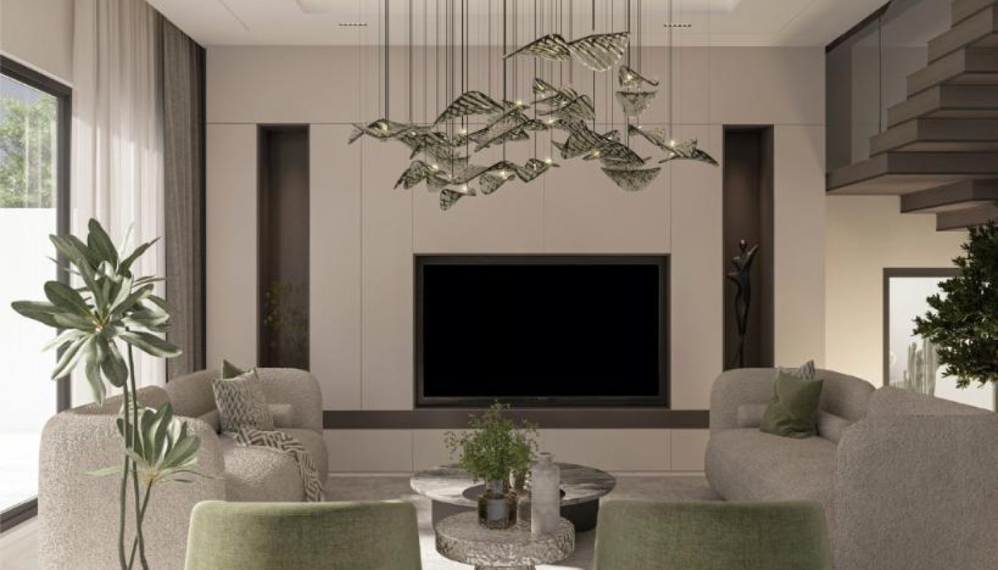 Modern living room with neutral and green furniture, a central coffee table, large TV, geometric chandelier, potted plants, and a staircase on the right. Natural light fills the space.