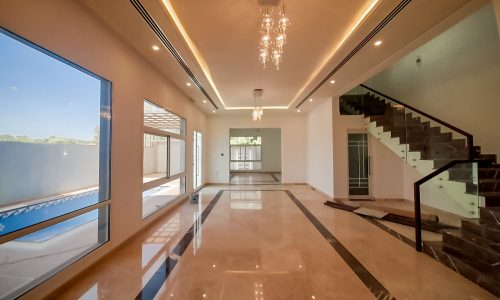 An eye-catching villa for sale in Jid Al Haj with a swimming pool.