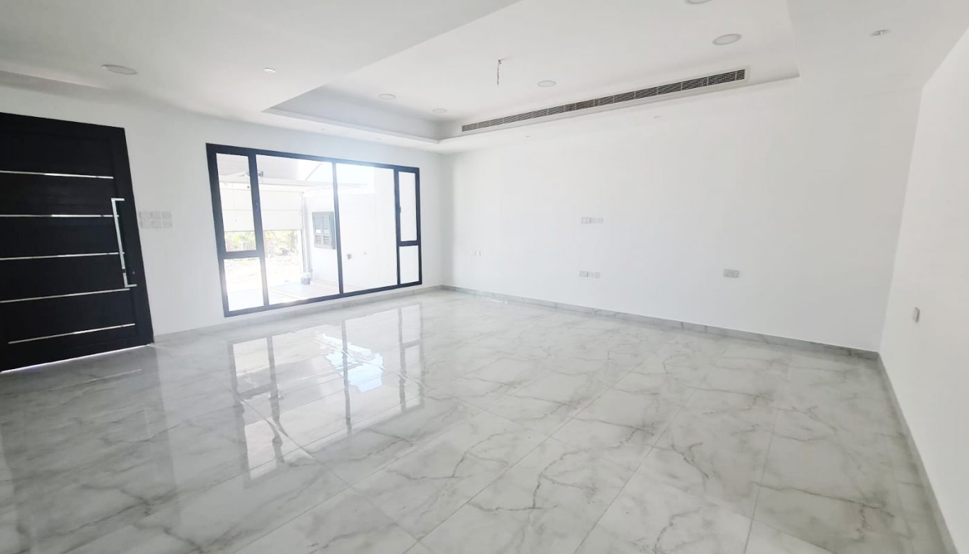 4-Bedroom Modern Luxury Villa for Sale in Barbar with marble floors and sliding glass doors.