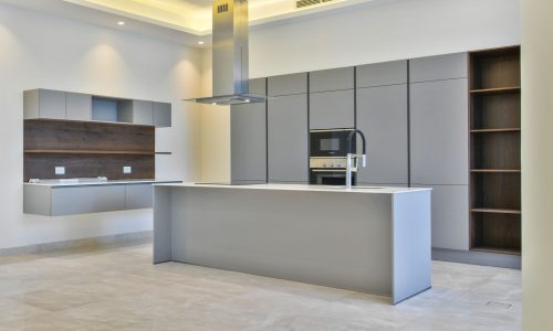 An Auto Draft kitchen with a grey island.