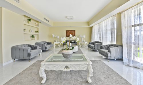 Bright and spacious living room interior in an amazing 5BR villa for rent, with elegant furniture and decor.