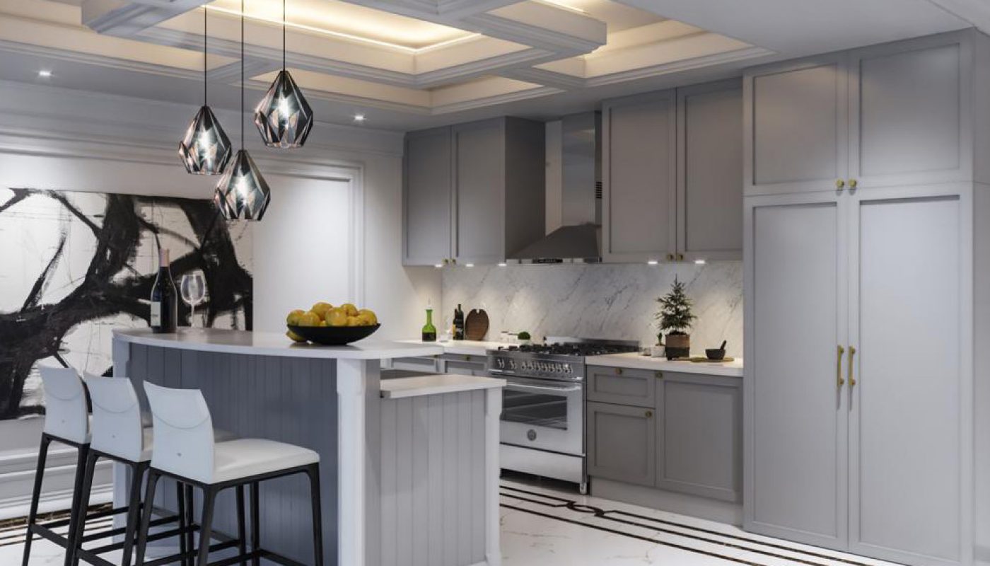 Modern kitchen with gray cabinets, a marble backsplash, an island with seating, pendant lights, and integrated appliances. A bowl of lemons sits on the island. Abstract art hangs on the wall.