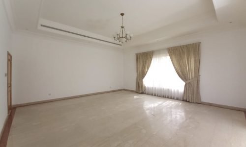 Luxury 4BR Villa with white walls and a chandelier for Rent in Janabiyah - Green Lash Compound.