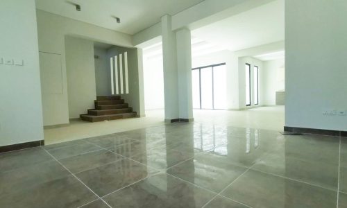 A spacious villa with tile floors and stairs available for sale in Diyar Al Muharraq.