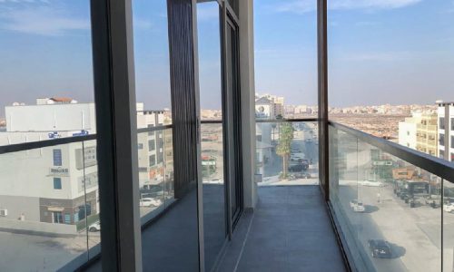 Sophisticated 2BR Flat for Rent in Janabiyah with Glass Railing Balcony.