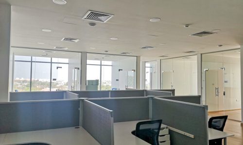 Empty office space with desks and cubicles available for rent in the great Saar area of Bahrain.