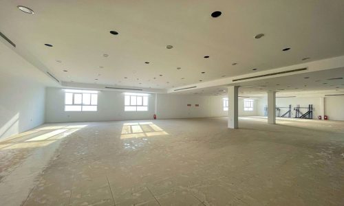 Bright office space for rent in Dubai's commercial Zinj area.