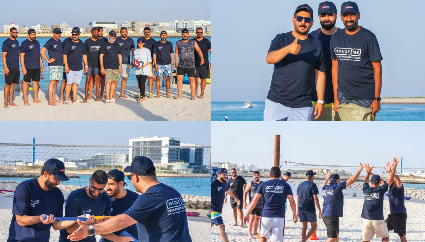 The House Me Sales Team enjoys a memorable day of team-building, participating in outdoor activities and volleyball on a sandy beach with buildings in the background.