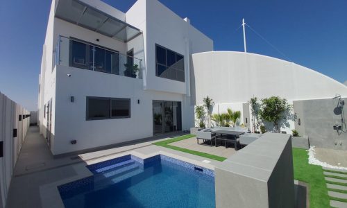 A luxurious 4BR villa in Diyar Al Muharraq with a swimming pool.