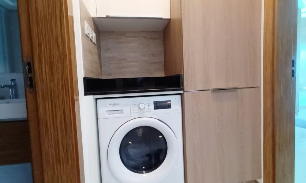 A washer and dryer in a small room with Auto Draft.