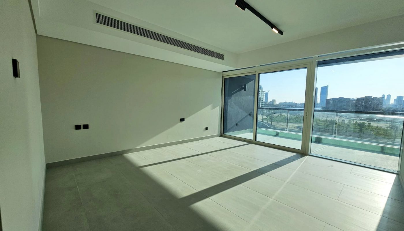 Empty modern apartment room with large windows, city view, and auto draft.