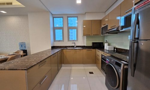 Modern kitchen interior with stainless steel appliances, granite countertops, and an Auto Draft system.